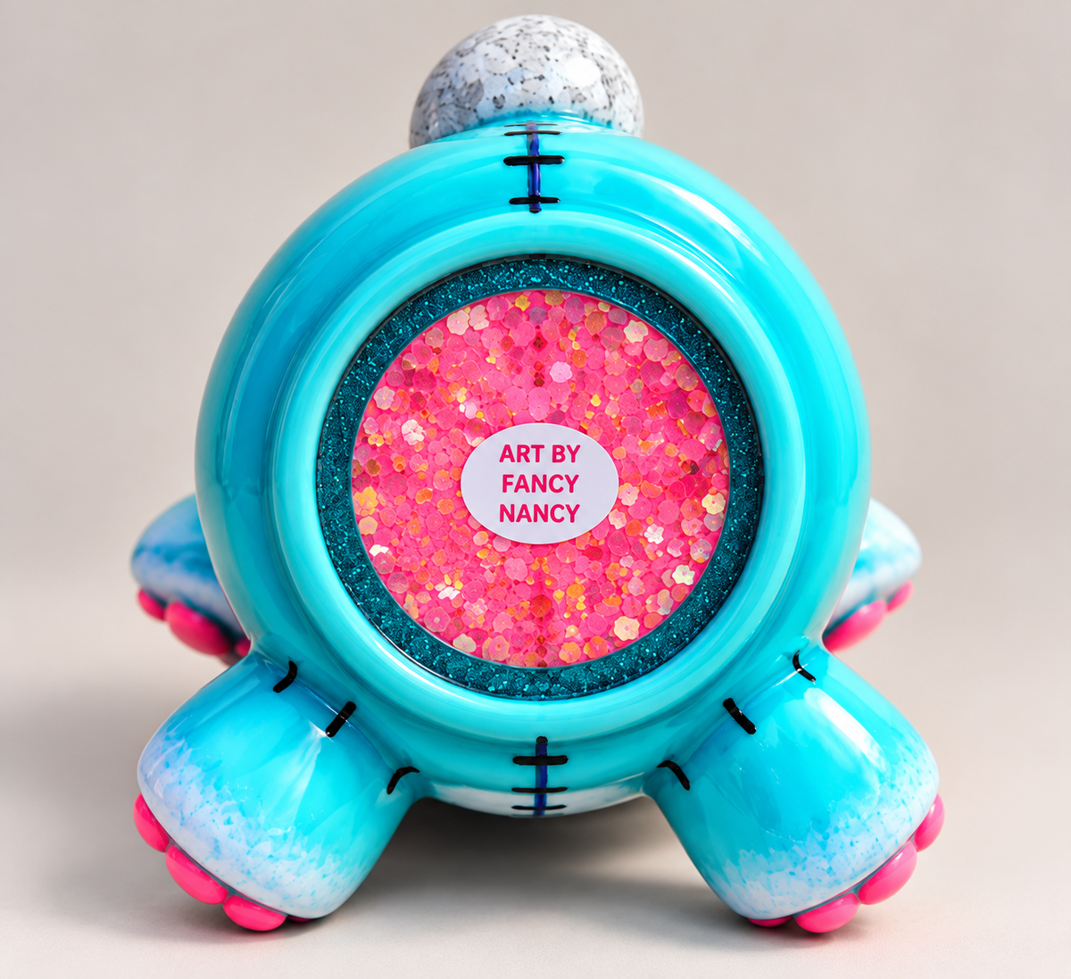 Underside of Funny Bunny 3D tumbler showing Art by Fancy Nancy maker mark