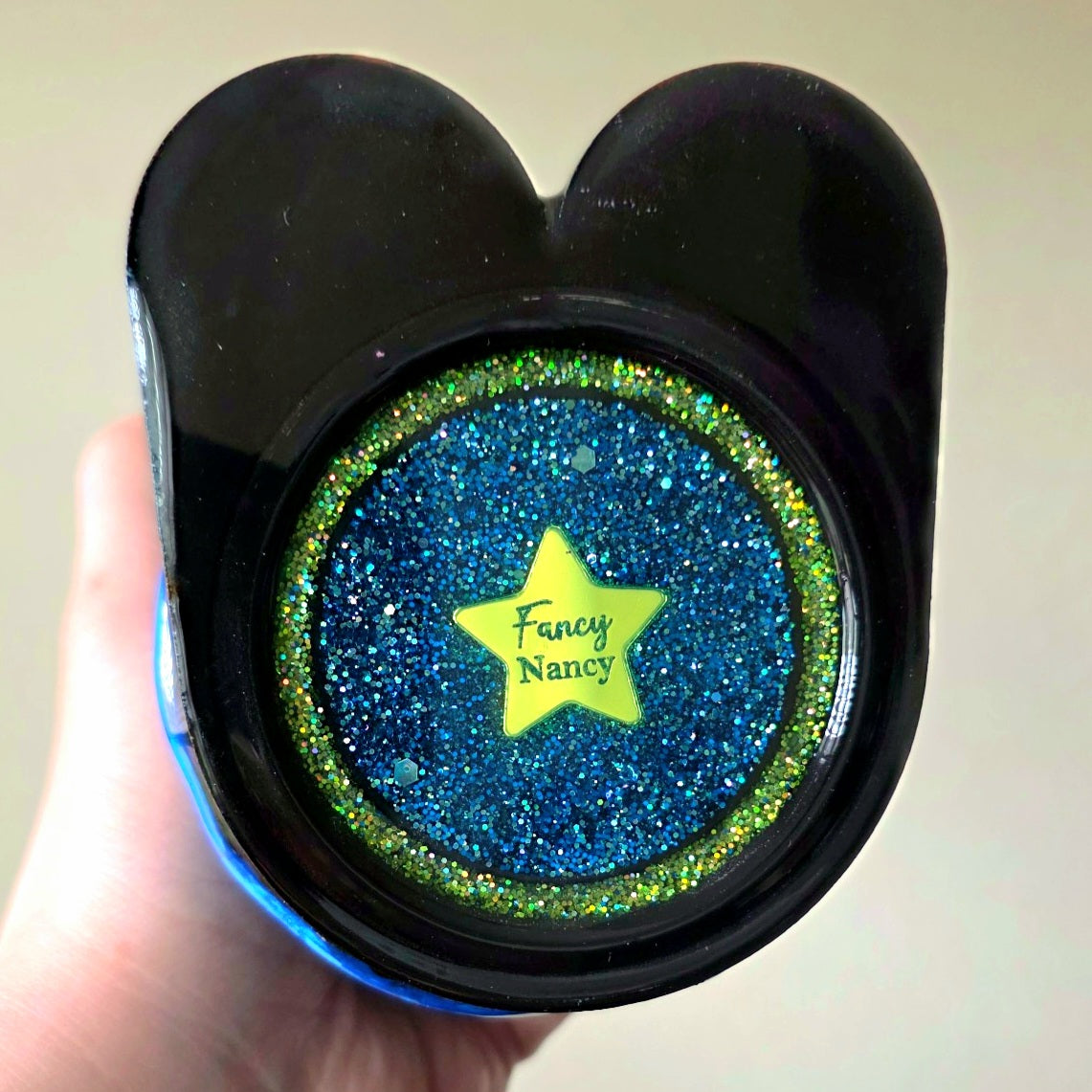 Bottom of hand-sculpted Green Plumber Dude tumbler with Fancy Nancy maker mark